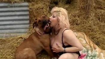 Fat lady is happy to get her pussy licked  by a dog