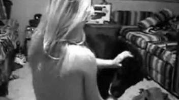 Big ass blonde bends for her dog which licks her