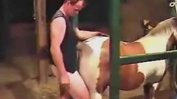 Dude in a sexy vest fucking a mare's hot young pussy