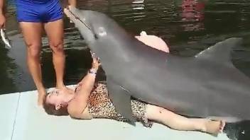 Sexy Cuban granny gets dry humped by a dolphin