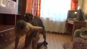 Blonde enjoying passionate oral loving with a dog